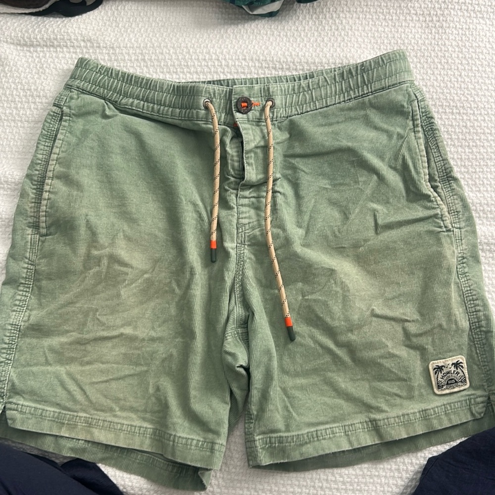 Gently worn Howler Bros green corduroy shorts